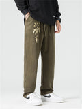 Men's Retro Gold Bamboo Leaf Embroidery Faux Suede Trousers